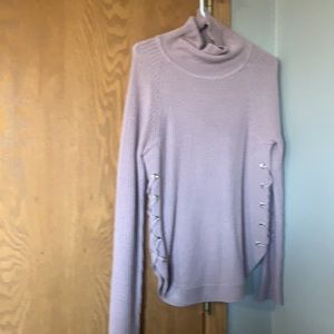 Venus light pink cowl neck sweater with crisscrossed rose gold grommets